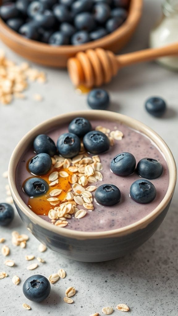 A delicious Blueberry Oatmeal Smoothie Bowl topped with fresh blueberries and oats.